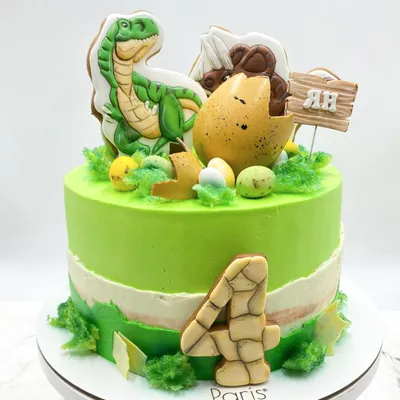 Фото, изображающее восхитительный торт с динозаврами в jpg