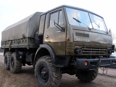 Грузовые автомобили: Масштабная модель 1:43 Бортовой военный грузовик 8х8  КамАЗ-6560, дорестайлинг, с тентом, хаки (Start Scale Models)