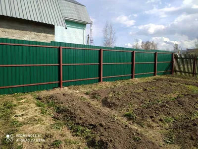 Забор из профнастила НС-21 Printech под темное дерево в Бишкеке